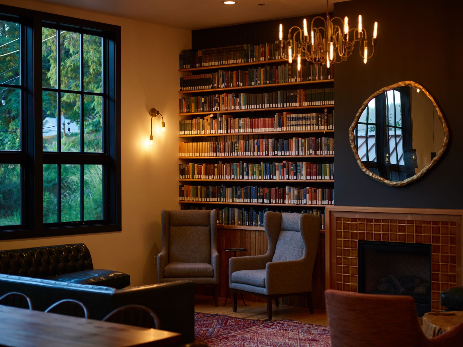 Custom built-in bookcases beside a fireplace